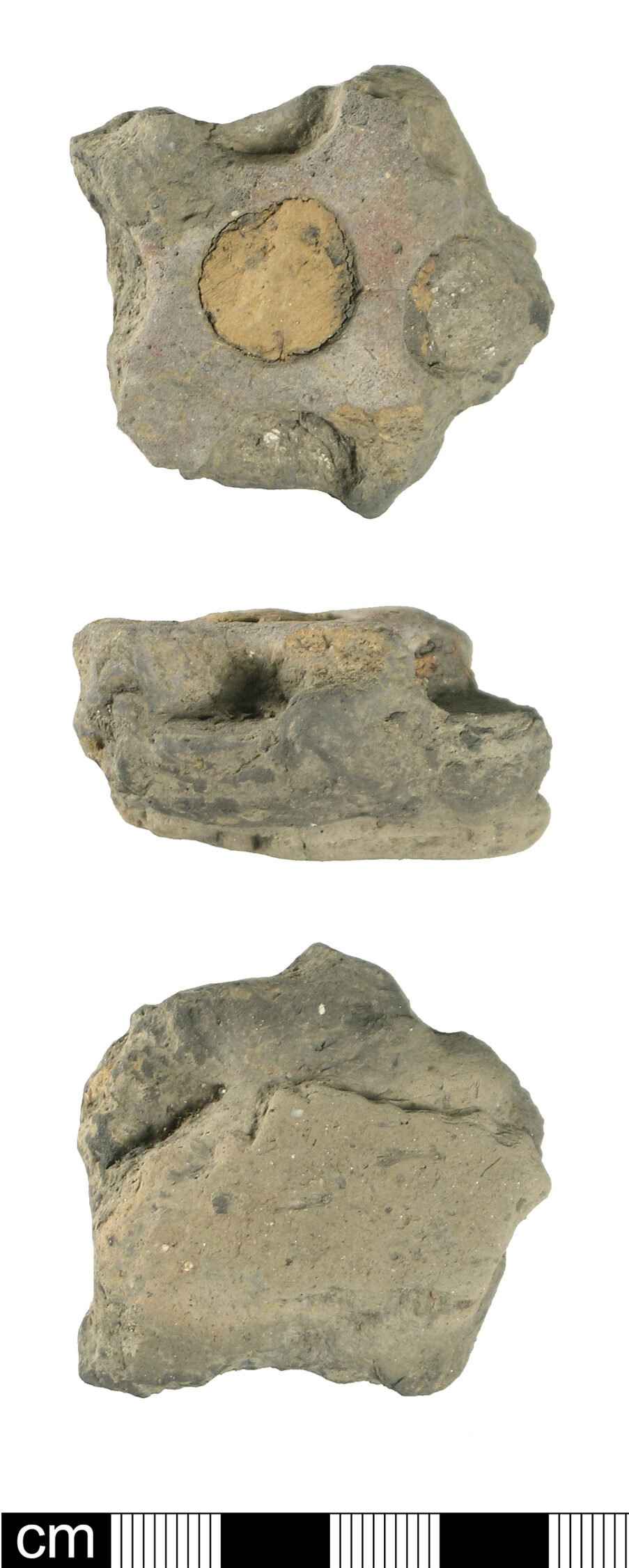 Iron Age coin mould fragment (Box 3, no. 40: showing capped pellet hole)