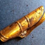 Kirkhaugh cairn gold ornament